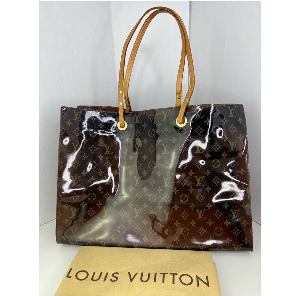 LOUIS VUITTON
Limited Edition Monogram Vinyl Ambre Cruise Tote Bag